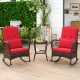 Two red cushioned rocking chairs with a 2-tier coffee table, made of PE rattan, perfect for outdoor relaxation.