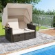 Outdoor patio rattan daybed with retractable canopy and adjustable backrests, perfect for backyard relaxation by the.