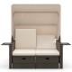 Outdoor patio rattan daybed in beige with retractable canopy and adjustable backrests, ideal for backyard relaxation.
