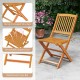 Outdoor folding chair made of acacia wood with breathable slatted seat and sturdy X-shaped structure, ideal for dining.