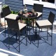 Set of 4 patio wicker barstools with backrest and footrest, featuring cream cushions, ideal for outdoor relaxation.