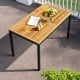 Acacia wood outdoor dining table with a sturdy metal frame, perfect for patio gatherings and meals.