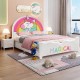 Children's twin size upholstered platform bed with a unicorn headboard, designed for safety and comfort in kids' rooms.