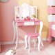 Kid's wooden vanity table and stool set in pink with a 3-panel acrylic mirror, perfect for a bedroom or play area.