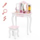 Kids vanity set in pink with tri-folding mirror, storage drawer, and makeup accessories for imaginative play.
