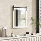 Wall mount mirror with white wood frame and black metal bracket, perfect for rustic decor in bedrooms or bathrooms.