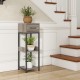 Gray 3-tier tall plant stand with drawer, showcasing raised baffle design and powder-coated metal for stability and.