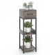3-tier tall plant stand in gray with drawer, featuring open shelves for plants and anti-tipping devices for safety.