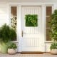 20" x 20" 3D hanging greenery hedge featuring 11 types of faux plants, ideal for indoor or outdoor decoration.