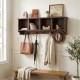 Wall-mounted brown coat rack with four compartments and five hooks, perfect for entryway storage and organization.
