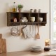 Wall-mounted brown storage cabinet with four compartments and five hooks for coats and keys, perfect for space-saving.