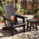 Black HDPE outdoor Adirondack chair with cup holder and wide armrests, perfect for relaxing in your garden or patio.