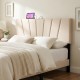 Beige geometric upholstered headboard for queen and full size beds with USB and AC outlets, offering minimalist design.