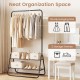 Heavy duty black clothes rack with a sturdy hanging rod and two storage shelves, ideal for organizing dresses and shoes.