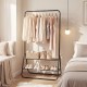 Heavy duty black clothes rack with hanging rod and two storage shelves, ideal for organizing dresses and accessories in.