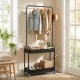 Heavy-duty black laundry cart with hanging rod, two storage baskets, and wheels for easy movement in bedrooms.