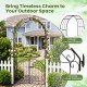 Heavy-duty black metal garden arch with gate, featuring classic arched shape and intricate curled patterns for outdoor.