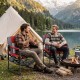 Heavy-duty outdoor camping chair in red with cup holder and side pocket, perfect for relaxing by the lake.