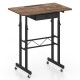 Height adjustable laptop desk in rustic brown with a fabric drawer, recessed tablet holder, and lockable wheels for mobility.