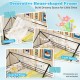 House-shaped metal twin over twin low bunk bed in black with decorative curtains, colorful flags, and light strips.