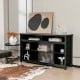 Black 58-inch TV stand with adjustable open shelves, designed for TVs up to 65", ideal for modern entertainment spaces.