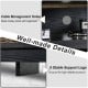 Close-up of cable management holes and stable support legs on the 58-inch black TV stand for organized and sturdy use.