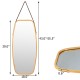 Close-up of the bamboo frame edge of a modern wall mirror with adjustable leather strap, enhancing any room's decor.
