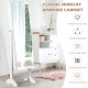 Standing jewelry armoire cabinet in white with full-length mirror, featuring ample storage for jewelry and cosmetics.