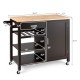 Rolling kitchen island cart with brown wood countertop, cabinet, drawer, and three open shelves for versatile storage.