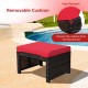 Red removable cushion on a durable patio rattan ottoman, designed for outdoor use and comfort by the poolside.