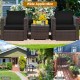 Patio conversation set featuring two black cushioned chairs and a glass-top table, perfect for outdoor relaxation.