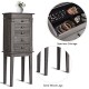 Standing jewelry cabinet with solid wood legs, five drawers, and embedded mirror for organized storage and elegant.