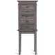 Standing jewelry cabinet organizer with five drawers, wooden legs, and embedded mirror for elegant jewelry storage.