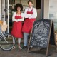 40-inch wood A-frame chalkboard sign with double-sided design, perfect for sidewalk advertising and event announcements.