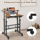 Mobile standing desk with adjustable tilting surface, walnut finish, and 4 casters for easy mobility in small spaces.