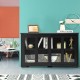 Black kitchen storage cabinet with glass sliding doors, showcasing a spacious top ideal for display or storage in a.