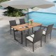 Acacia wood outdoor dining table with 2-inch umbrella hole, seating 6, set by poolside for versatile outdoor use.