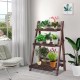 Close-up of the three-tier wooden folding flower stand showcasing its natural wood finish, ideal for plants and.