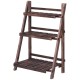 Three-tier folding flower stand made of durable fir wood, perfect for displaying plants in outdoor or indoor settings.
