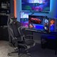 Reclining swivel gaming chair in gray with lumbar support, adjustable backrest, and ergonomic design for comfort.