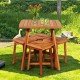 Square acacia wood dining table with four stools, perfect for outdoor gatherings in garden or balcony settings.