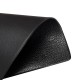 Textured black PVC equipment mat, 47 x 24 x 0.3 inches, designed for home gym use, protects floors and reduces noise.