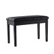 Black PU leather piano bench with solid wood frame, storage compartment, and anti-slip feet pads for stability.