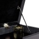 Close-up of the storage compartment in the Solid Wood PU Leather Piano Bench, featuring a sturdy lock and.