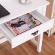 White computer desk drawer showcasing magazines, featuring a modern design and four drawers for organization.