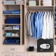 2-layer safe deposit box with digital keypad, made of durable steel, mounted in a closet for secure storage of.
