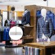 Half body male mannequin with adjustable metal base, perfect for displaying shirts and jackets in retail settings.