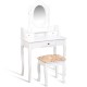 Vanity makeup dressing table in white with rotating mirror, three drawers, and cushioned stool for elegant storage.