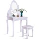 Wooden vanity set in white with 360° rotating oval mirror, cushioned stool, and five storage drawers for home decor.