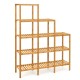 Multifunctional bamboo plant shelf organizer with 5-tier design, perfect for storage in living room or balcony.